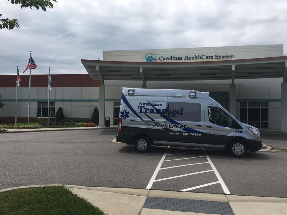 American Transmed Ambulance in front of Carolinas Healthcare System